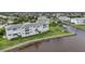 Waterfront condo featuring well-maintained lawn, boat docks, and a small gazebo at 1250 W Marion Ave # 333, Punta Gorda, FL 33950