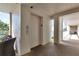 Well-lit condo hallway featuring an elevator, neutral tones, and a welcoming space with an outdoor view at 1250 W Marion Ave # 333, Punta Gorda, FL 33950