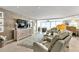 Open-concept living room with stylish decor and beautiful water views at 1250 W Marion Ave # 333, Punta Gorda, FL 33950