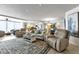 Bright and open living area with modern furnishings and views of the kitchen at 1250 W Marion Ave # 333, Punta Gorda, FL 33950
