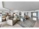 Open-concept living space with a view to the office, dining, and kitchen at 1250 W Marion Ave # 333, Punta Gorda, FL 33950