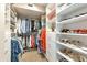 Spacious walk-in closet with custom shelving and hanging space for organized storage at 1250 W Marion Ave # 333, Punta Gorda, FL 33950