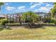 Spacious backyard with a screened pool, landscaping, and space for outdoor activities at 13139 Preserve Ct, Port Charlotte, FL 33953