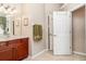 Bathroom with a modern vanity with granite countertop, mirror, and stylish fixtures at 13139 Preserve Ct, Port Charlotte, FL 33953