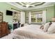 Comfortable bedroom featuring a sliding glass door and ample natural light at 13139 Preserve Ct, Port Charlotte, FL 33953
