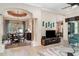 Open-concept area with adjacent dining area showcasing pillars and an exterior view at 13139 Preserve Ct, Port Charlotte, FL 33953