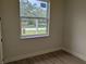 Bedroom features a bright window at 136 Sequoyah Dr, Port Charlotte, FL 33954