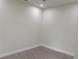 Empty room featuring neutral walls and luxury vinyl flooring at 136 Sequoyah Dr, Port Charlotte, FL 33954