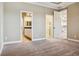 Bedroom showing ensuite bathroom and walk-in closet, providing ample storage at 170 Antilla Dr, Rotonda West, FL 33947