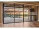Covered patio with an outdoor kitchen and water views at 170 Antilla Dr, Rotonda West, FL 33947