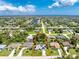 Wide aerial view of a property with a defined lot, showing the home's location within a residential area at 18147 Brazil Ave, Port Charlotte, FL 33948