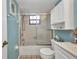 Well-lit bathroom featuring a shower/tub combination and storage at 19505 Quesada Ave # Tt101, Port Charlotte, FL 33948