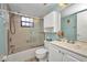 This updated bathroom has a shower/tub combo and white vanity at 19505 Quesada Ave # Tt101, Port Charlotte, FL 33948