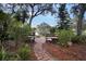 Beautiful courtyard area with serene pond view and seating; great for relaxation at 19505 Quesada Ave # Tt101, Port Charlotte, FL 33948