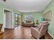 Living room with slider door access to the outside at 19505 Quesada Ave # Tt101, Port Charlotte, FL 33948