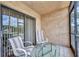 Enclosed patio with seating provides a relaxing outdoor retreat at 19505 Quesada Ave # Tt101, Port Charlotte, FL 33948