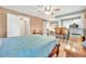 Spacious bedroom with tile floors and ensuite bathroom, featuring a mini bar at 2131 Amanda Dr, Sarasota, FL 34232