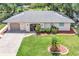 Charming single-story home with a well-manicured lawn and inviting curb appeal at 2131 Amanda Dr, Sarasota, FL 34232