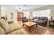 Spacious open concept living area with tile floors, large windows, and neutral decor at 2131 Amanda Dr, Sarasota, FL 34232