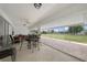 Enjoy the spacious covered patio, perfect for outdoor entertaining with a beautiful backyard view at 23141 Corvin Ave, Port Charlotte, FL 33954