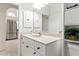 Bright bathroom featuring a vanity with an oversized mirror at 2329 Como St, Port Charlotte, FL 33948