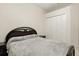 This bedroom offers a comfortable layout and ample closet space for convenient storage solutions at 2329 Como St, Port Charlotte, FL 33948