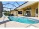 This screened pool area offers an amazing place to relax, entertain and enjoy the Florida sunshine at 2329 Como St, Port Charlotte, FL 33948