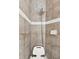 Close-up of tiled shower with shower head and built in seat at 2329 Como St, Port Charlotte, FL 33948