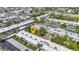Birds eye view of the complex with surrounding buildings, landscaping and a nearby parking area at 2437 Harbor Blvd # 114, Port Charlotte, FL 33952