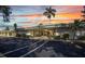 The Essex House features a well maintained entrance with beautiful landscaping and ample parking at 2437 Harbor Blvd # 114, Port Charlotte, FL 33952