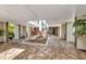 Building foyer featuring seating and a skylight in a spacious and well-maintained area at 2437 Harbor Blvd # 114, Port Charlotte, FL 33952