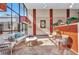 Building lobby area showcases comfortable seating, ample natural light and a tiled floor at 2437 Harbor Blvd # 114, Port Charlotte, FL 33952