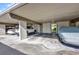 Covered parking spaces at a low-rise condo building, spaces are adjacent to building entrance at 2437 Harbor Blvd # 114, Port Charlotte, FL 33952