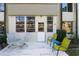 Private outdoor patio area featuring ample seating and a peaceful view at 2437 Harbor Blvd # 114, Port Charlotte, FL 33952
