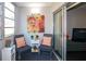 Cozy sunroom with comfortable seating, bright artwork, and lots of natural light at 2437 Harbor Blvd # 114, Port Charlotte, FL 33952