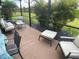 Inviting screened lanai with comfortable seating and lush greenery, perfect for relaxing outdoors at 25228 E Lenox Cir, Punta Gorda, FL 33950