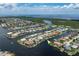 Aerial view of waterfront homes with access to a serene waterway at 2814 La Mancha Ct, Punta Gorda, FL 33950