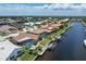 Beautiful waterfront property featuring a private dock, boat lift, and screened-in pool in a desirable coastal community at 2814 La Mancha Ct, Punta Gorda, FL 33950
