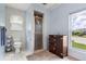 Bathroom featuring tile floors, glass shower, and wood cabinet at 2814 La Mancha Ct, Punta Gorda, FL 33950