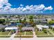 Aerial view of a beautiful single-Gathering home on a canal, in a waterfront community at 330 Weber Ter, Port Charlotte, FL 33952