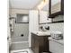 Well-maintained bathroom with a tub, vanity, and medicine cabinet at 330 Weber Ter, Port Charlotte, FL 33952