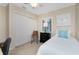 Bedroom with a twin bed, desk, chair and natural light from the window at 330 Weber Ter, Port Charlotte, FL 33952