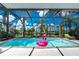 Screened in pool area with clear roof for sunny days and privacy fencing at 330 Weber Ter, Port Charlotte, FL 33952
