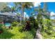 Outdoor pool area surrounded by tropical landscaping for privacy at 330 Weber Ter, Port Charlotte, FL 33952