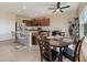 Spacious kitchen with granite countertops, stainless appliances, a breakfast bar and tile floors at 3631 Pebble Ter, Punta Gorda, FL 33980