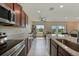 Modern kitchen features stainless steel appliances, granite countertops and an open floor plan at 3631 Pebble Ter, Punta Gorda, FL 33980