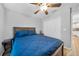 Comfortable bedroom featuring a wood bed frame and matching nightstand at 369 Hyacinth St, Port Charlotte, FL 33954