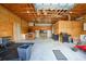 Spacious garage with exposed rafters, a grill, and work bench at 369 Hyacinth St, Port Charlotte, FL 33954