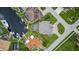 Overhead aerial view highlighting a waterfront property with a private pool and boat dock at 3800 Carupano Ct, Punta Gorda, FL 33950