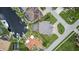 Overhead aerial view highlighting a waterfront property with a private pool and boat dock at 3800 Carupano Ct, Punta Gorda, FL 33950